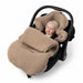 Zaffiron beige Nevada lämpöpussi kaukalossa vauvalla
